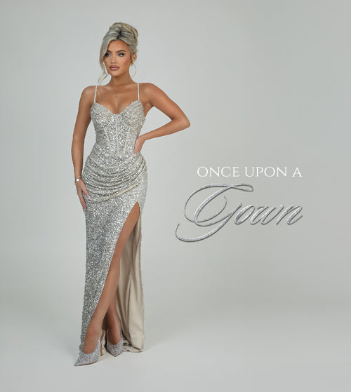 Women's silver embellished sequin prom gown with thigh high slit. corset style bodice and adjustable straps. Model is 5ft2' and wears a size XS 6.