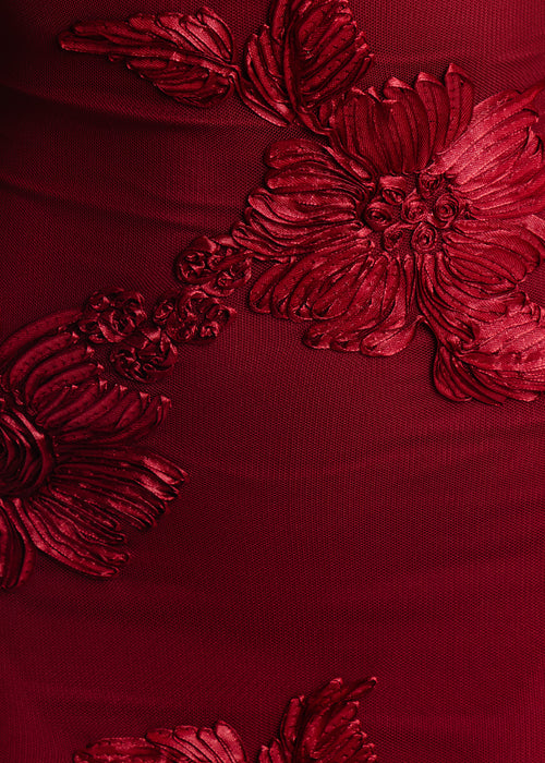 Close up detail of 3-D applique embroidery on fabric 