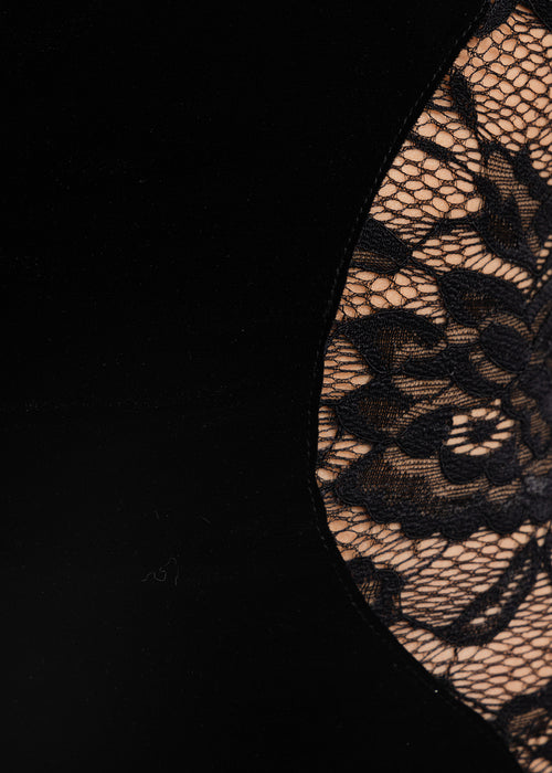 Women's little black dress with halterneck, bodycon fit and lace details. Model is 5ft2' and wears a size XS6.