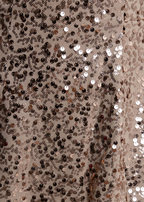 Women's gold sequin mini dress with strapless fit and a-line style. Fully embellished with rose gold sequins. Model is 5ft2' and wears a size XS 6.