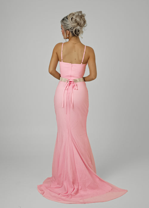 Women's pastel pink ball gown with sparkly mesh fabric overlay, Bardot neckline and a built in diamante silver belt. 