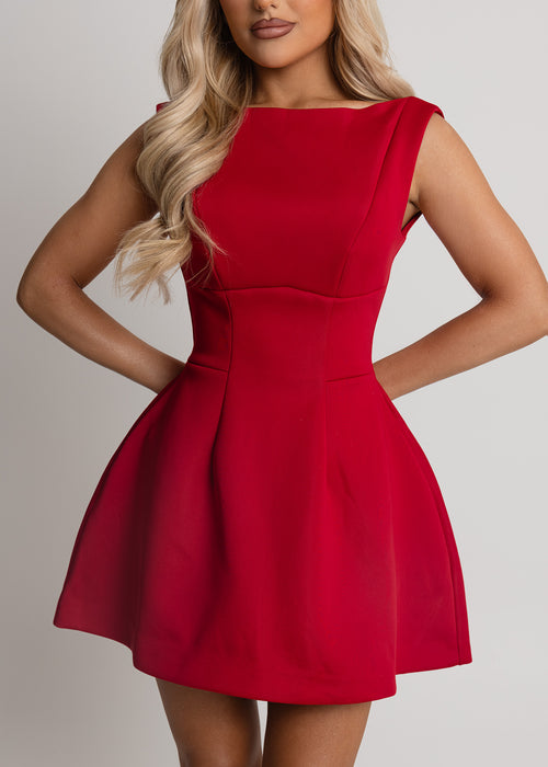 Women’s red structured mini dress with fitted waist and flared skirt. Elegant fit-and-flare style perfect as a Christmas party outfit or winter night out dress. Model is 5ft7' and wears a size S 8.