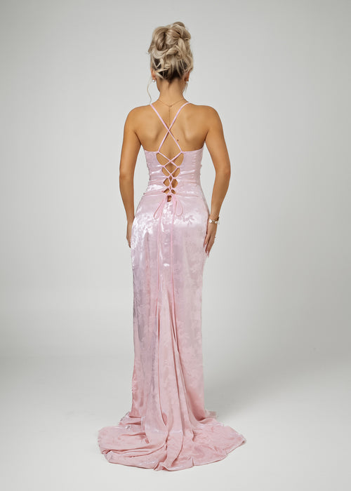 Women's Jacquard pink satin maxi dress with a side split and lace up black detail. 